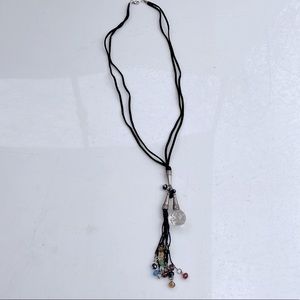 Crystal on black leather strings necklace